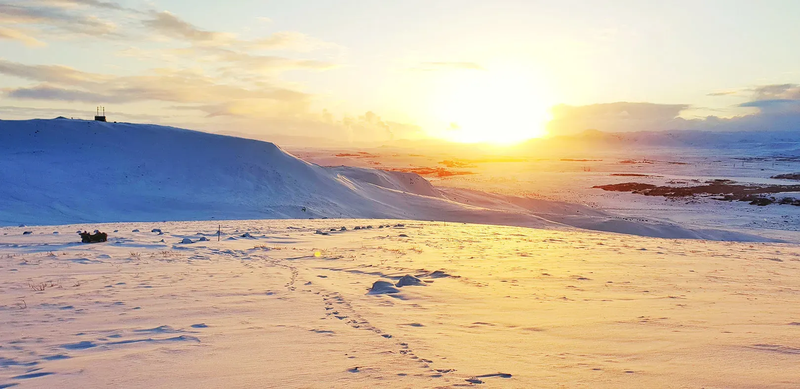 Sunset over a snowy plateau